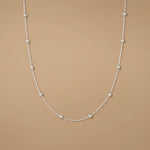 Load image into Gallery viewer, A sterling silver necklace featuring a chain with interlinked silver links and a pendant.