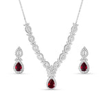 Load image into Gallery viewer, A sterling silver jewelry set including a necklace, bracelet, earrings, and ring, adorned with red and clear colored stones.