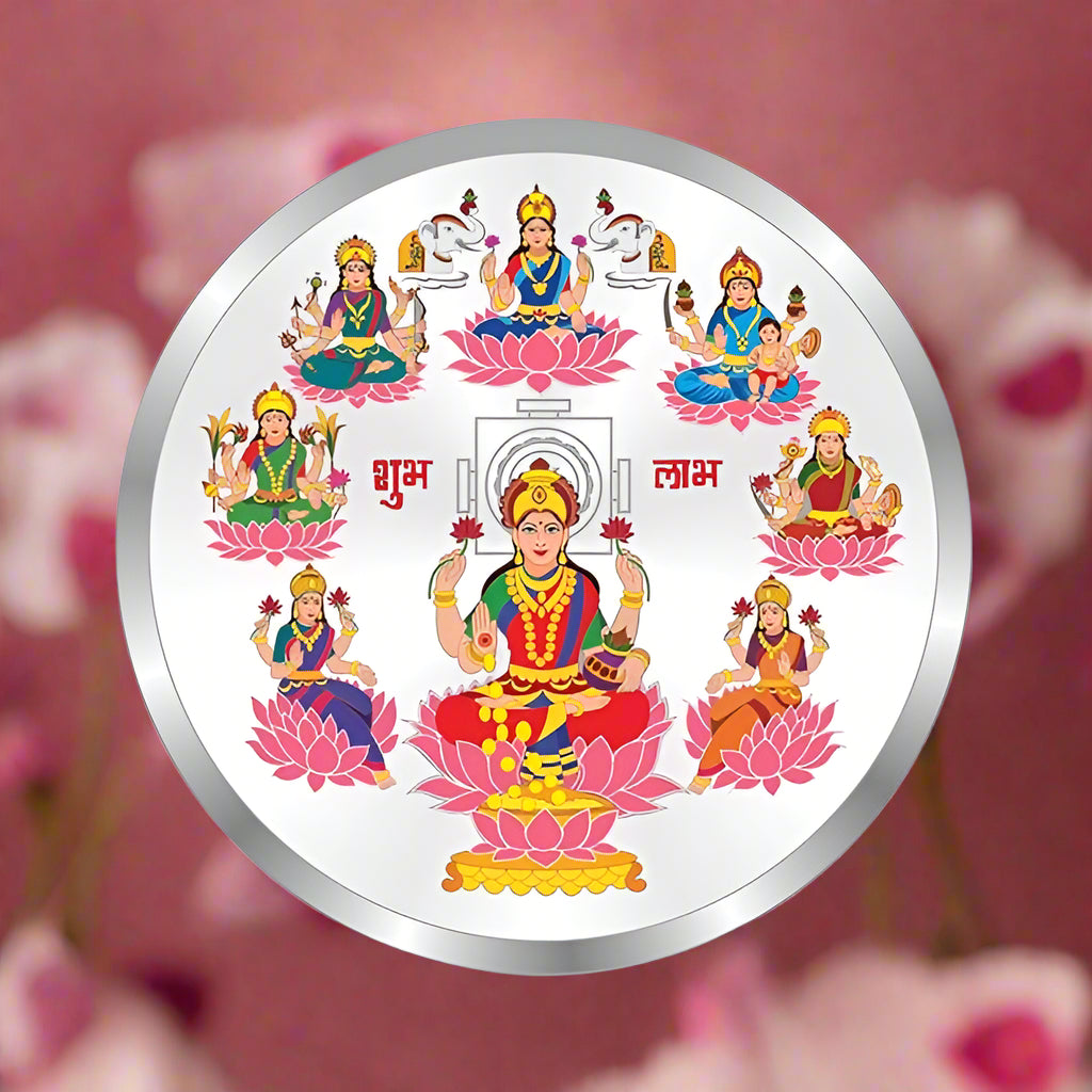 A 999 purity silver coin with a design depicting 'Astha Laxmi' seated on a lotus flower with other deities surrounding her.