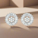 Load image into Gallery viewer, A pair of sterling silver baguette cut earrings studded with clear cubic zirconia, arranged in a circular pattern with a central point.