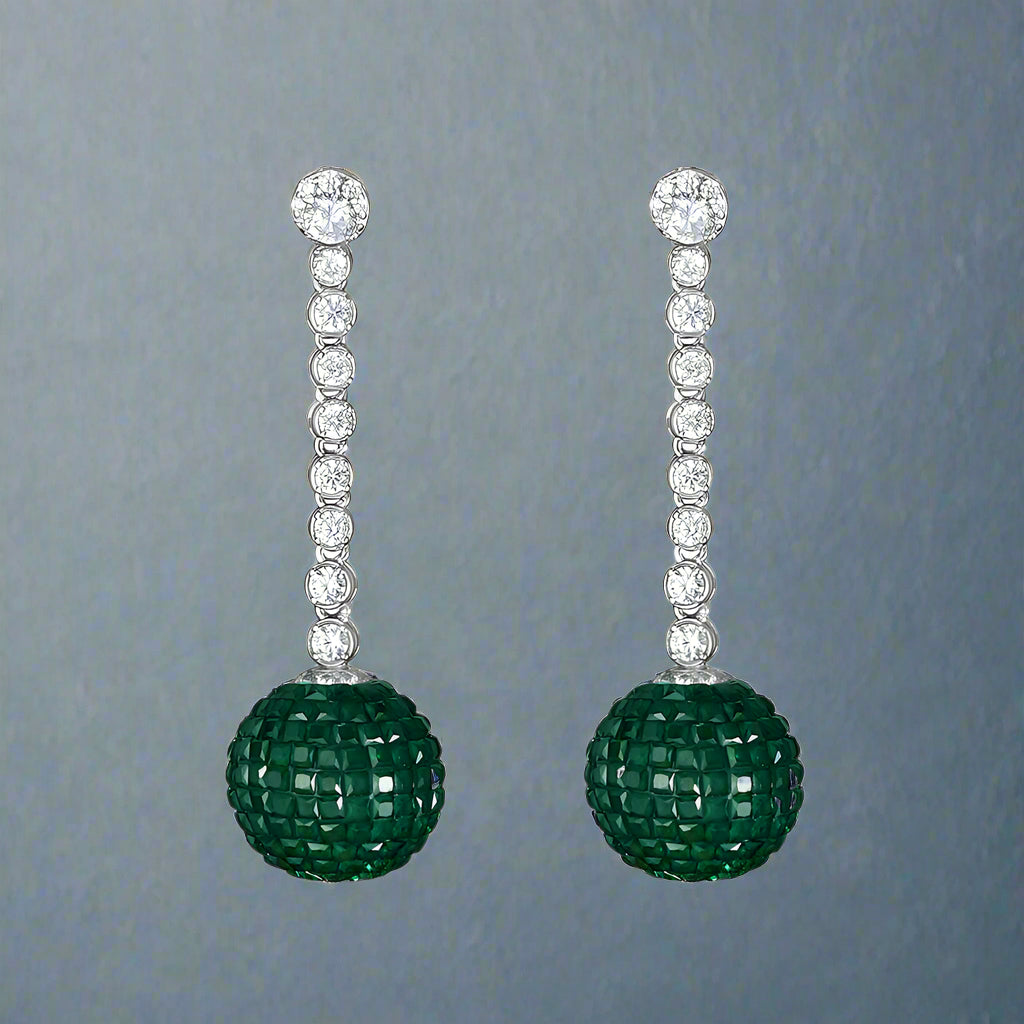 green silver dangling earrings