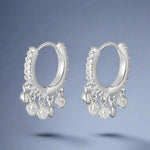 Load image into Gallery viewer, A pair of sterling silver Bali earrings with cubic zirconia embellishments.