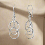 Load image into Gallery viewer, A pair of 925 sterling silver earrings featuring a geometric circle link design.
