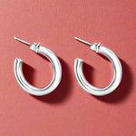 Load image into Gallery viewer, A pair of 925 Sterling Silver Hoop Earrings with a silver finish.