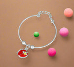 Load image into Gallery viewer, A silver bracelet with a charms of a bird and a heart, designed for kids.