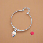 Load image into Gallery viewer, A silver bracelet with a cat-shaped charm, part of the Bloom Kids collection designed for newborns to 3-year-old children.