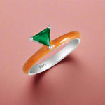 Load image into Gallery viewer, A sterling silver ring with a multicolored enamel coating and a central cubic zirconia stone, surrounded by smaller clear cubic zirconia's on the band.