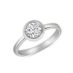 Load image into Gallery viewer, A Shubham Bezel 925 Sterling Silver Solitaire Ring with a large clear cubic zirconia centerpiece, displayed on a white background.