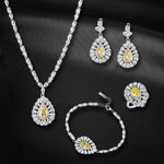 Load image into Gallery viewer, Signature Yellow 925 Sterling Silver Set of 4 pieces. Studded with Rose cut Cubic Zircons  (Necklace, Bracelet, Earring &amp; Ring)
