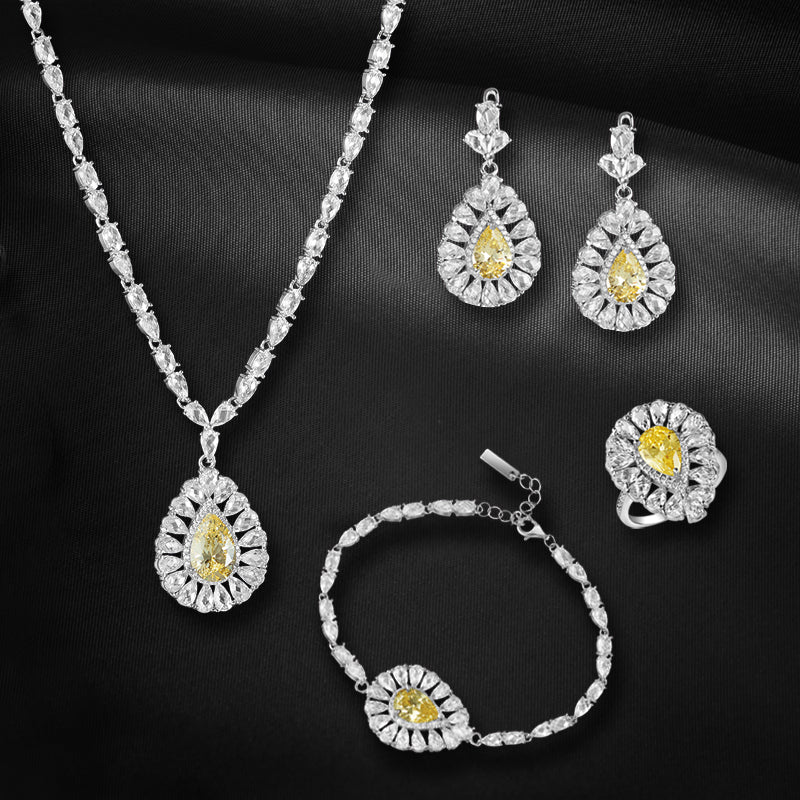 Signature Yellow 925 Sterling Silver Set of 4 pieces. Studded with Rose cut Cubic Zircons  (Necklace, Bracelet, Earring & Ring)