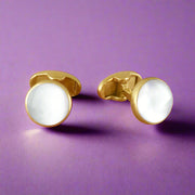 A pair of gold-plated 925 sterling silver cufflinks with mother of pearl inlays, displayed against a white background.