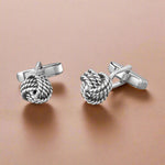 Load image into Gallery viewer, Silver knot cufflinks on a white background

