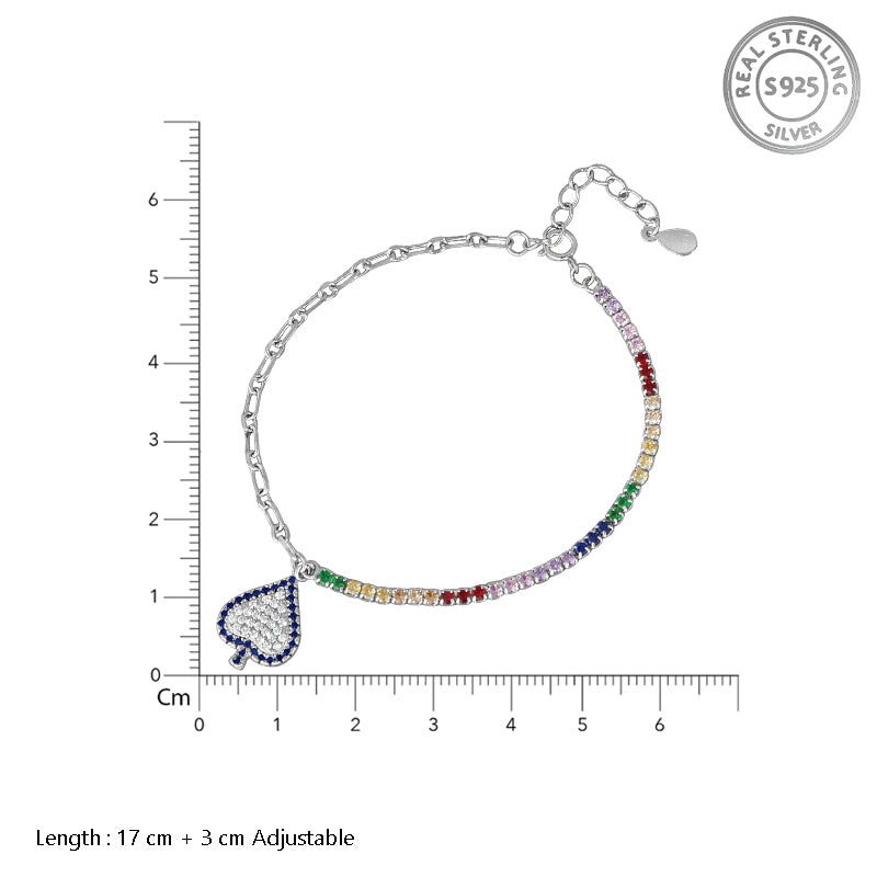 Silver bracelet with colorful heart charm and measurement scale on a white background