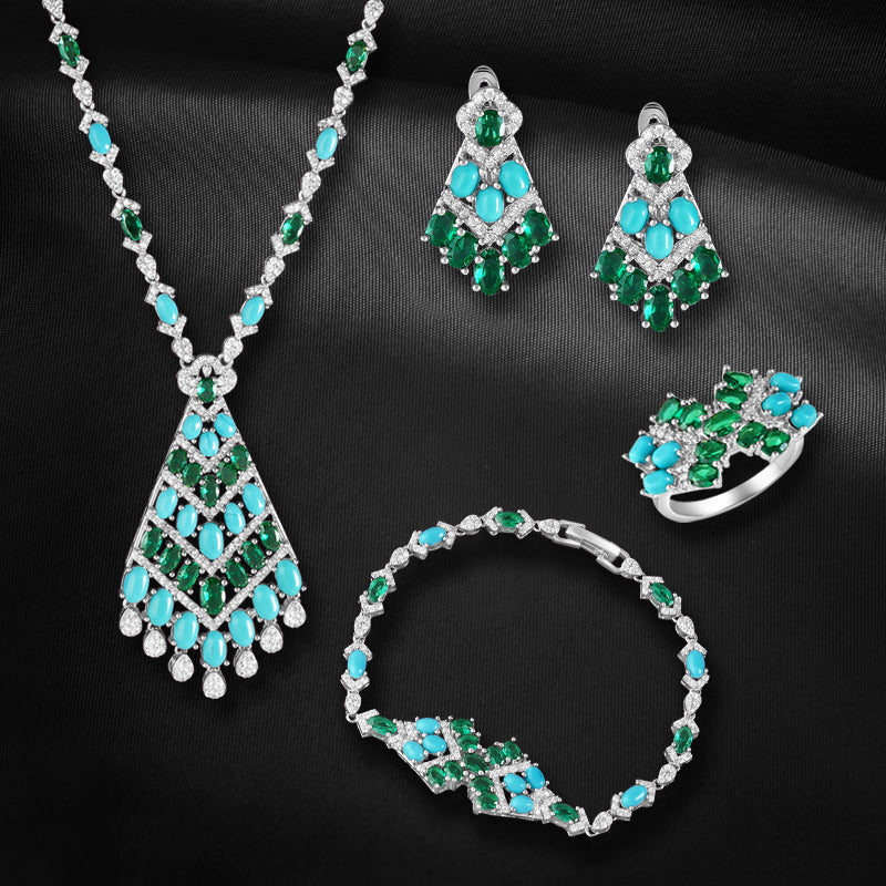 Mridula 925 Sterling Silver Set of 4 pieces. Studded with Cubic Zircons  (Necklace, Bracelet, Earring & Ring)