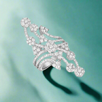 Load image into Gallery viewer, A 925 sterling silver ring with multiple sparkling stones set around its circumference.

