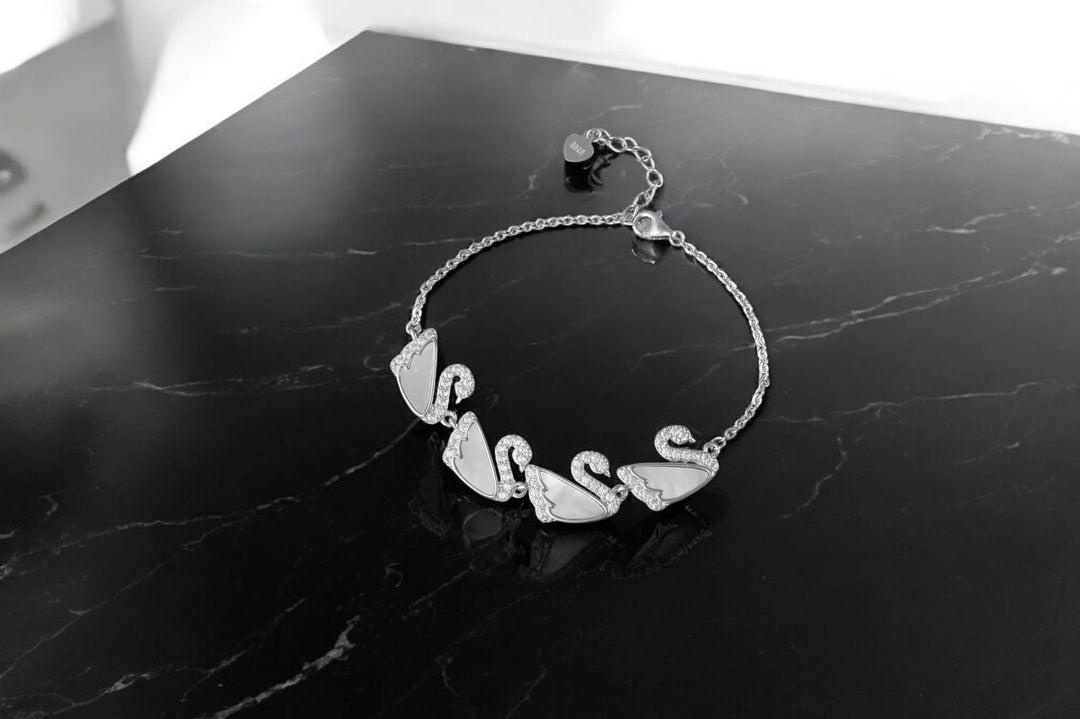 Dancing Swan Bracelet 925 Sterling Silver White, Rhodium Plated. With adjustable Length