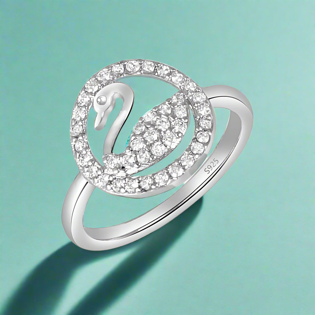 A 925 sterling silver ring featuring a graceful swan design adorned with sparkling AAA cubic zirconias.