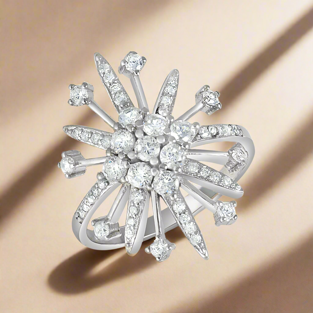 A 925 sterling silver ring with multiple sparkling stones set in a central star-shaped design, surrounded by smaller round-shaped settings.