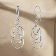 A pair of 925 sterling silver earrings featuring a geometric circle link design.