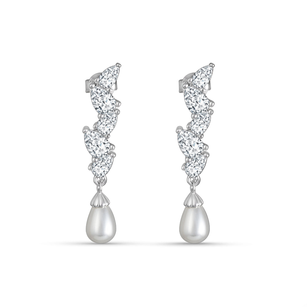 Pair of silver earrings with teardrop-shaped pearls on a white background