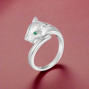A sterling silver ring featuring a panther motif with cubic zirconia stones set within the design.