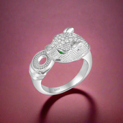 A sterling silver ring featuring a panther motif with cubic zirconia stones set in the design.