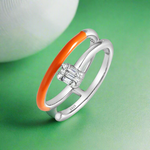 Load image into Gallery viewer, A sterling silver ring with a colorful enamel design and accented with AAA cubic zirconia.
