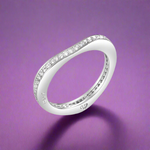 Load image into Gallery viewer, A sterling silver eternity ring set with cubic zirconia stones, featuring a full eternity design.
