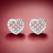 A pair of plain silver stud earrings with a heart pattern and inset with small clear crystals.
