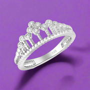 A 925 sterling silver ring with a crown design, adorned with AAA cubic zirconia.