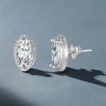 Load image into Gallery viewer, A pair of sterling silver earrings with a marquise shape and a cubic zirconia center, displayed against a white background.
