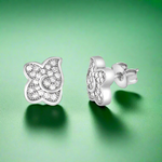 Load image into Gallery viewer, A pair of sterling silver earrings in a butterfly wing design, adorned with cubic zirconia.
