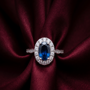 Elegant 925 Sterling Silver Emerald-Cut Red Stone Halo Ring