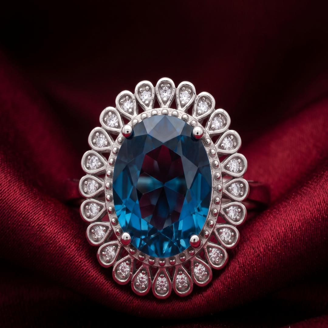 Stunning 925 Sterling Silver Red Gemstone Halo Ring with Side Accents