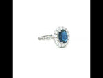 Load and play video in Gallery viewer, Elegant 925 Sterling Silver Emerald-Cut Red Stone Halo Ring